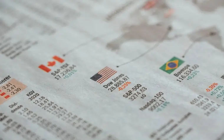 Close-up of a financial market table printed in a newspaper