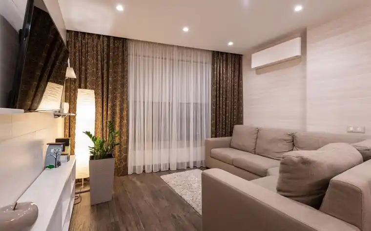 Living room interior with an air conditioner installed